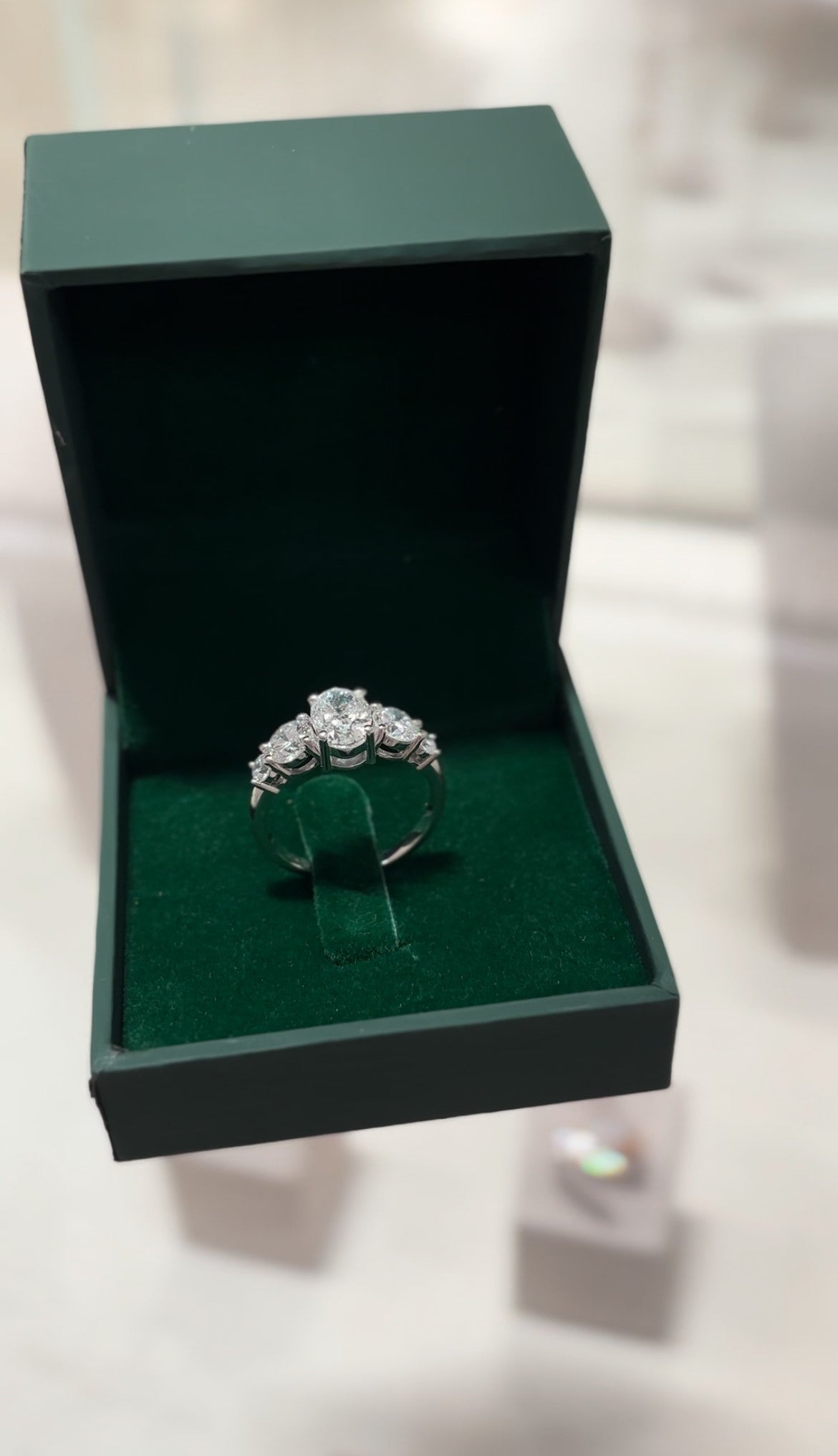 Oval Side Stones Engagement Ring